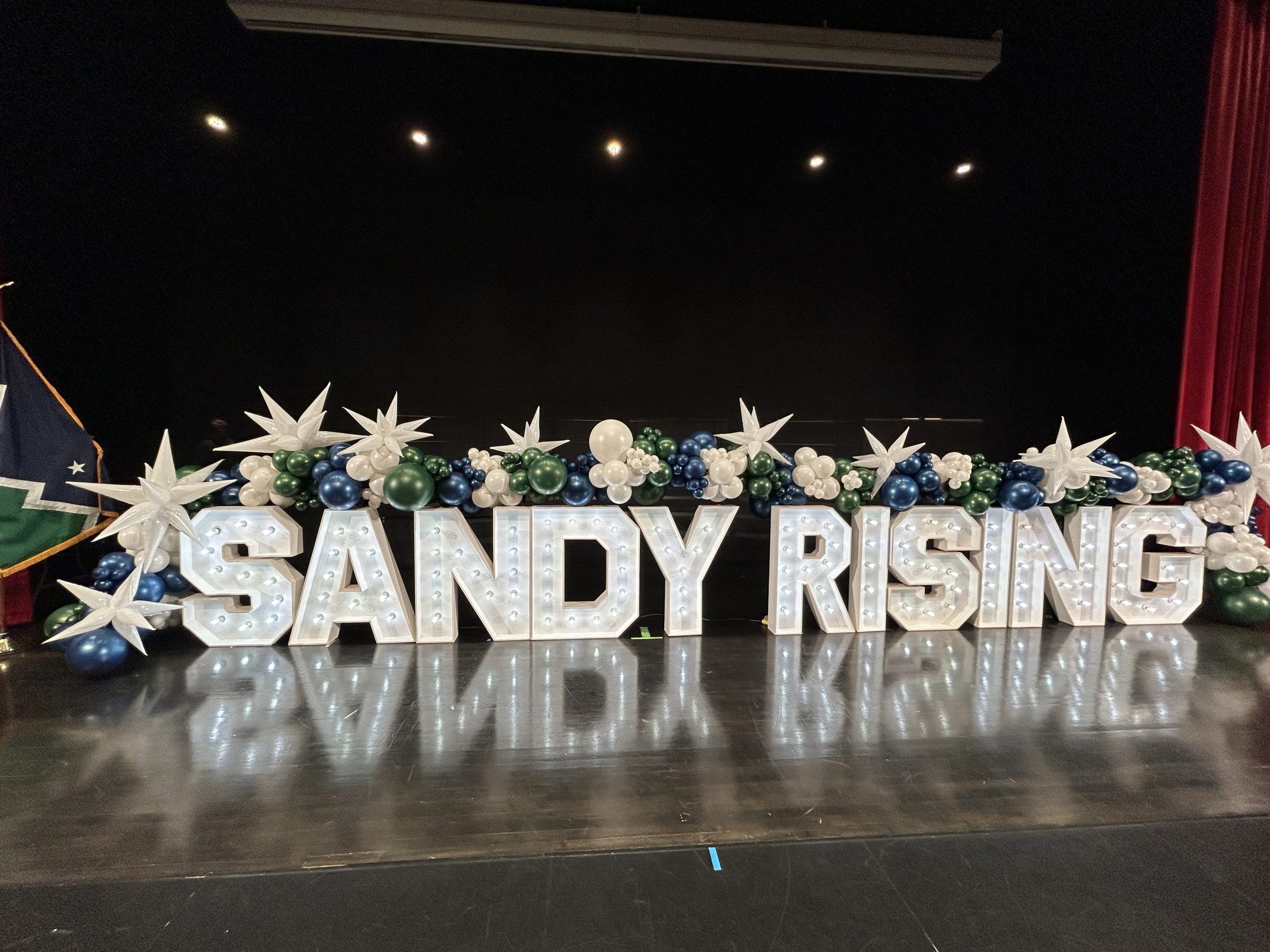 Sandy Rising — a 27‑foot installation celebrating community and leadership at the Sandy City Mayor’s Oath of Office.